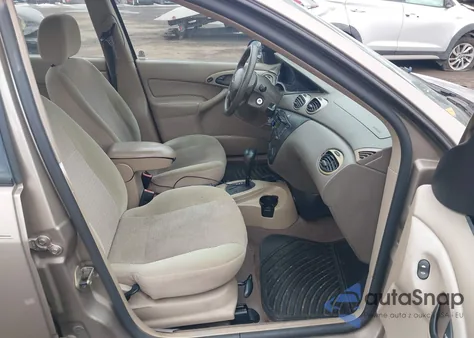 2003 Ford Focus Se/Ztw z USA, uszkodzony, nr VIN 1FAFP36323W287227